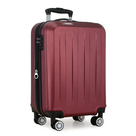 Red wheeled suitcase for travel